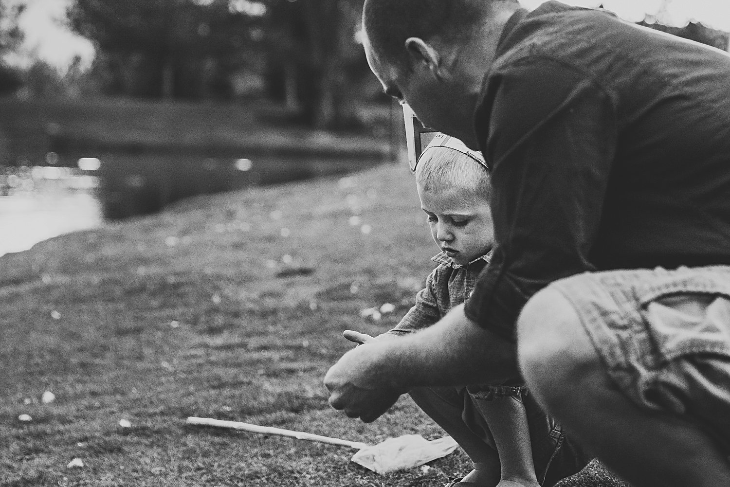 Candid family portrait of dad with young boy