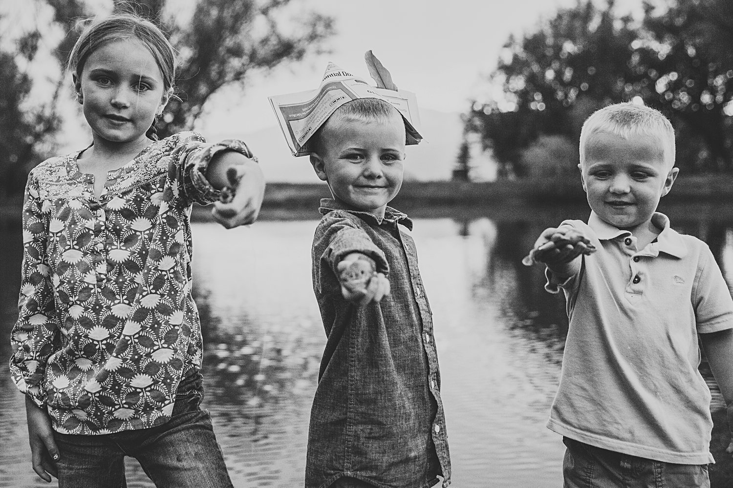 Family portrait of three young kids