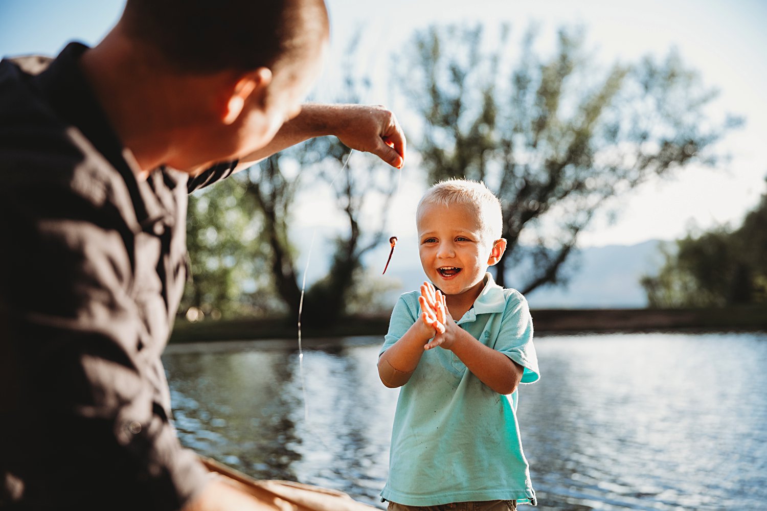 Candid family portrait of dad with young boy