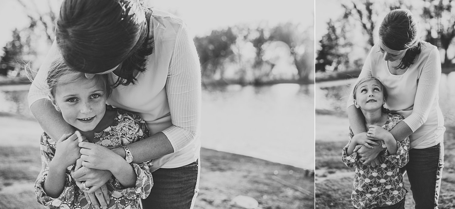 Portraits of mom and young daughter hugging