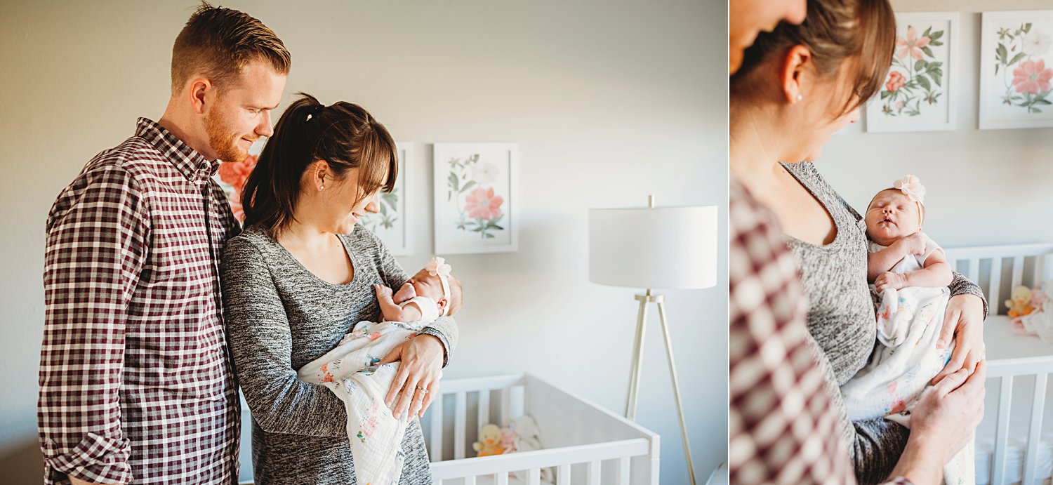 Lifestyle newborn photos of mom and dad holding baby in nursery